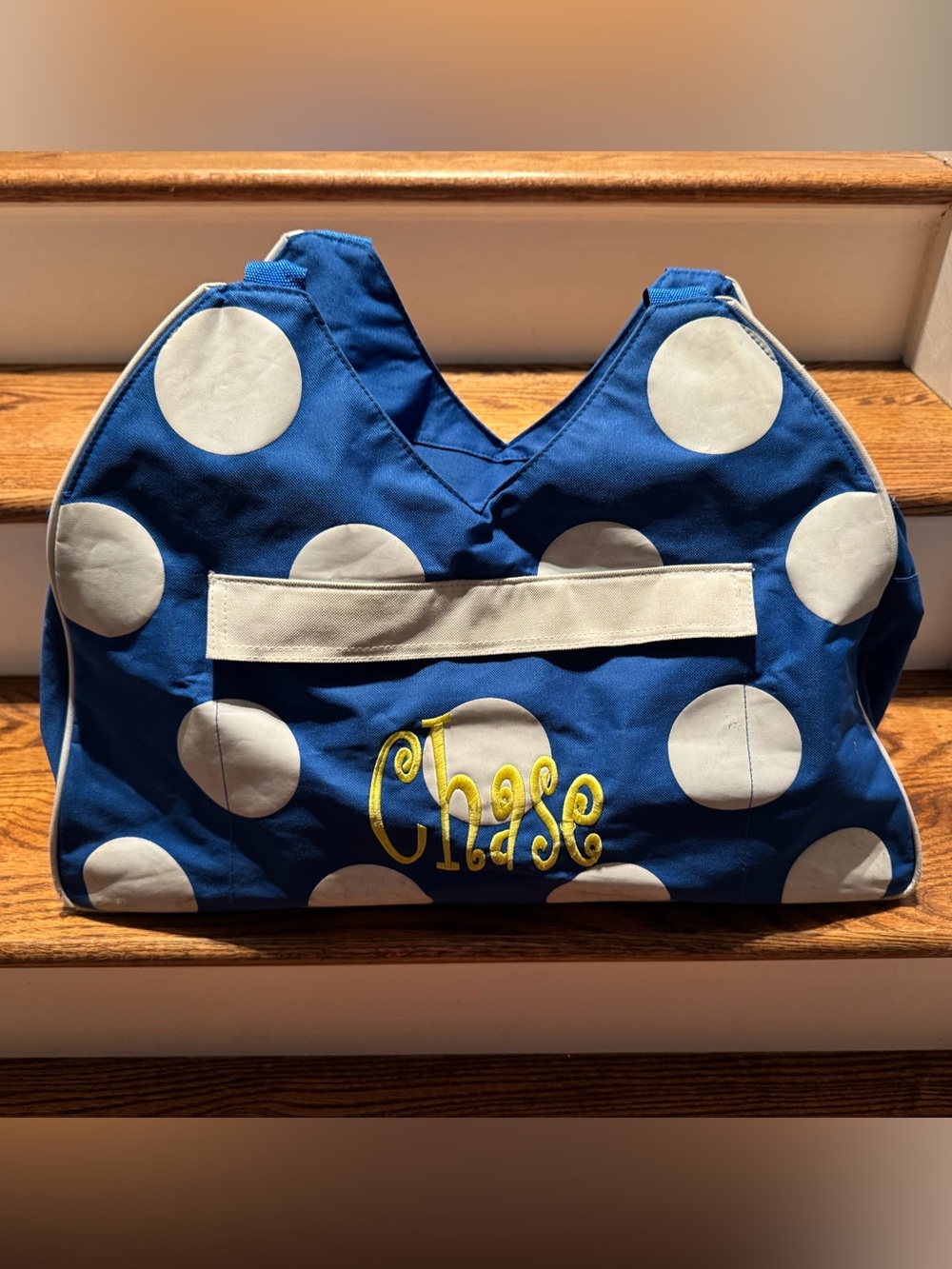 Large blue Chase monogrammed zippered bag